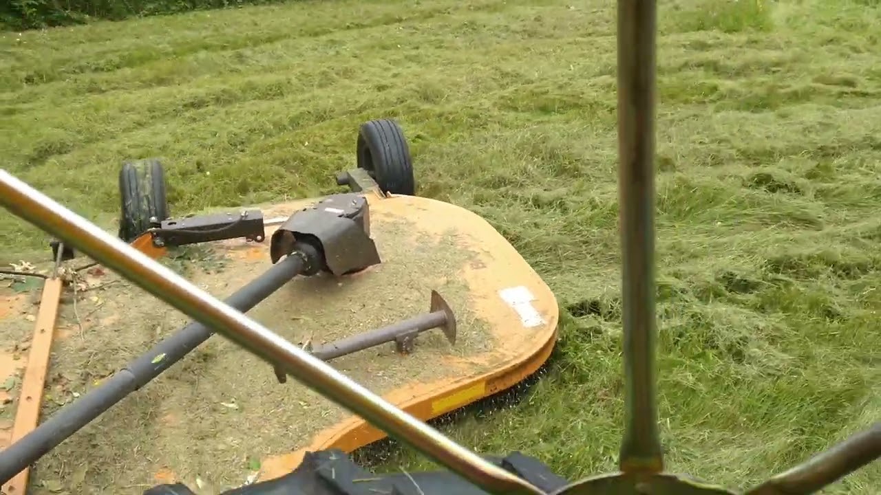 John Deere 4020 mowing invasive weeds with  Woods BW15.50