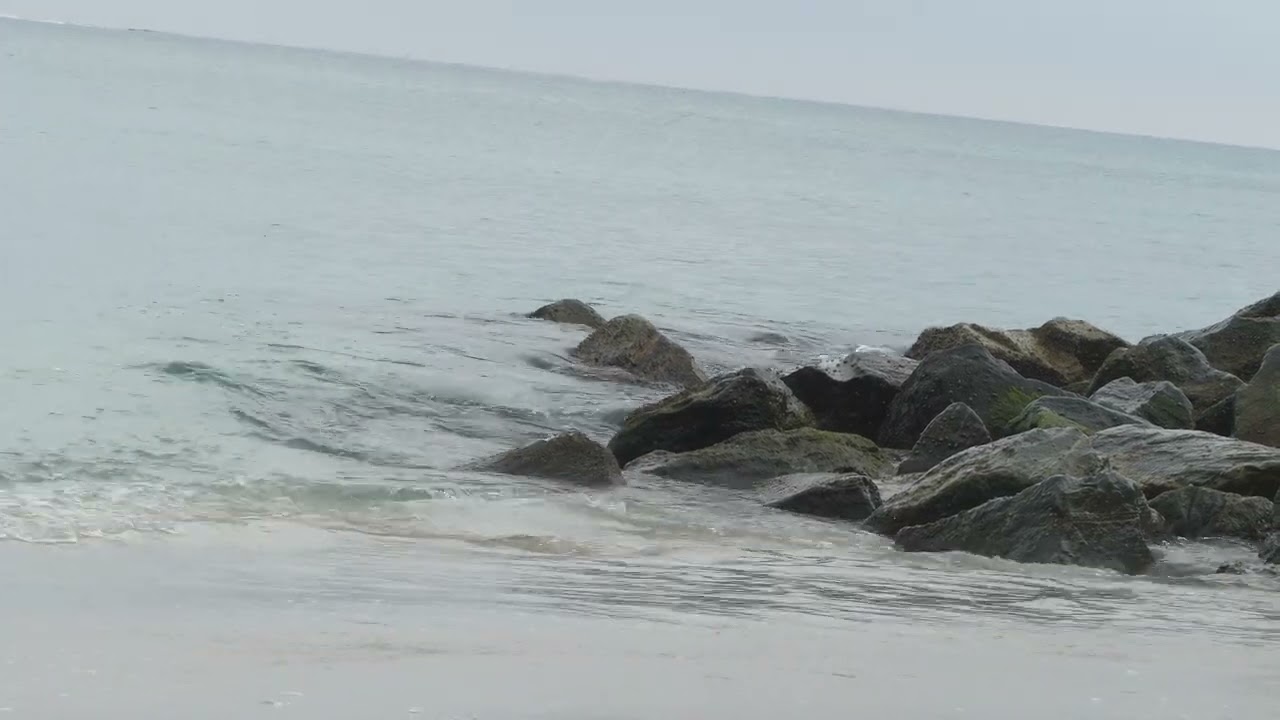 Mesmerizing Ocean Waves Crash Against Ancient Rocky Shore!