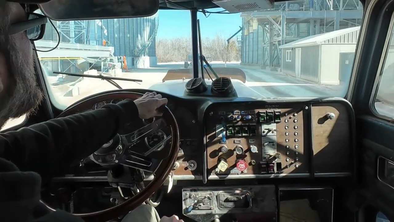  1984 Peterbilt 359 hauling some corn. 