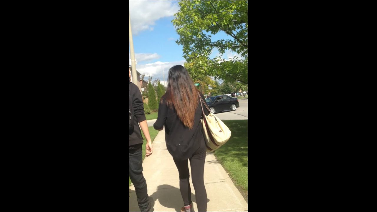 Cute romantic Couple holding hands hugging and walking
