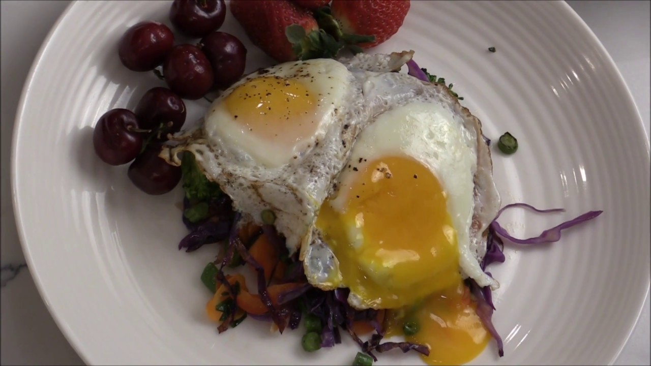 Breakfast Stir-Fry Vegetables Over Fried Eggs
