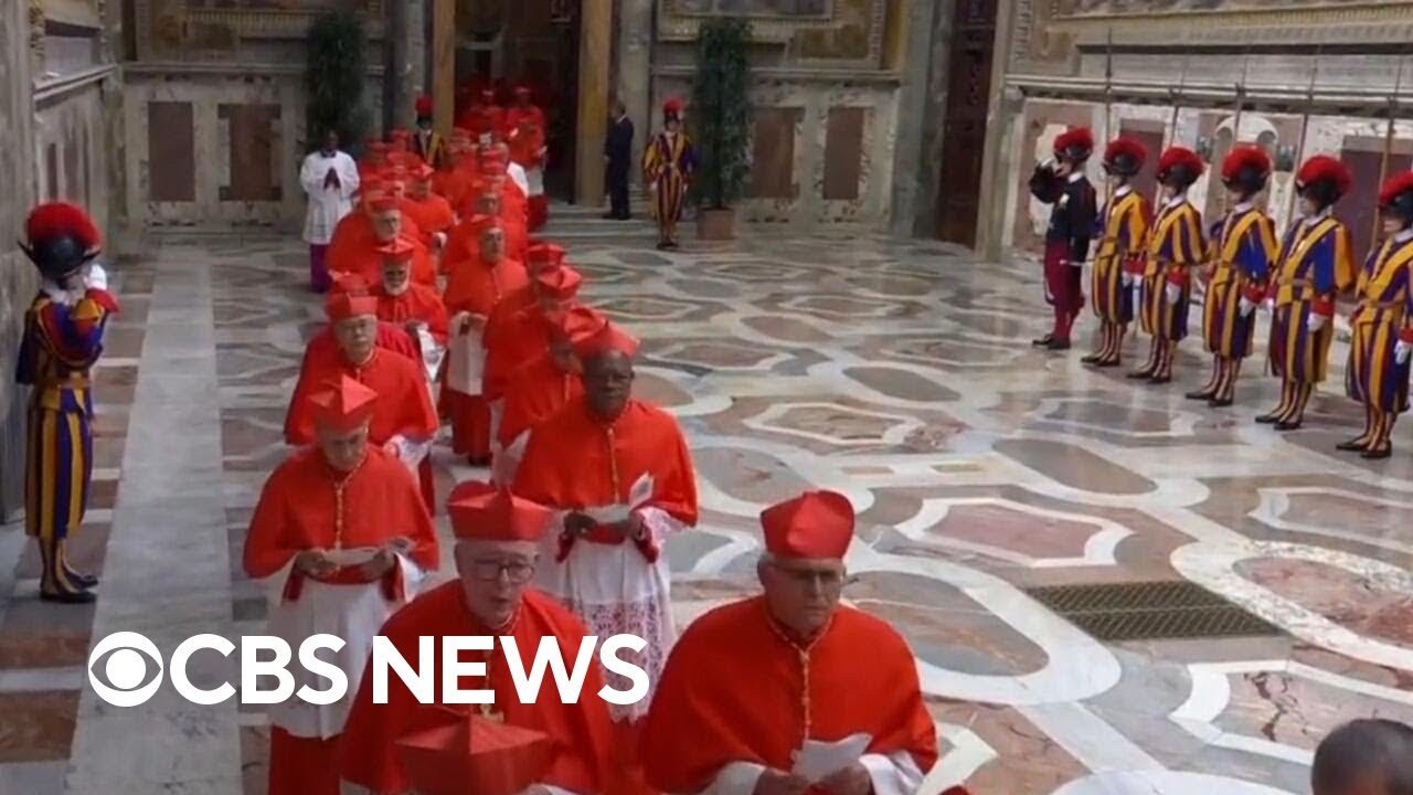 Procession into Sistine Chapel for conclave as cardinals sing 