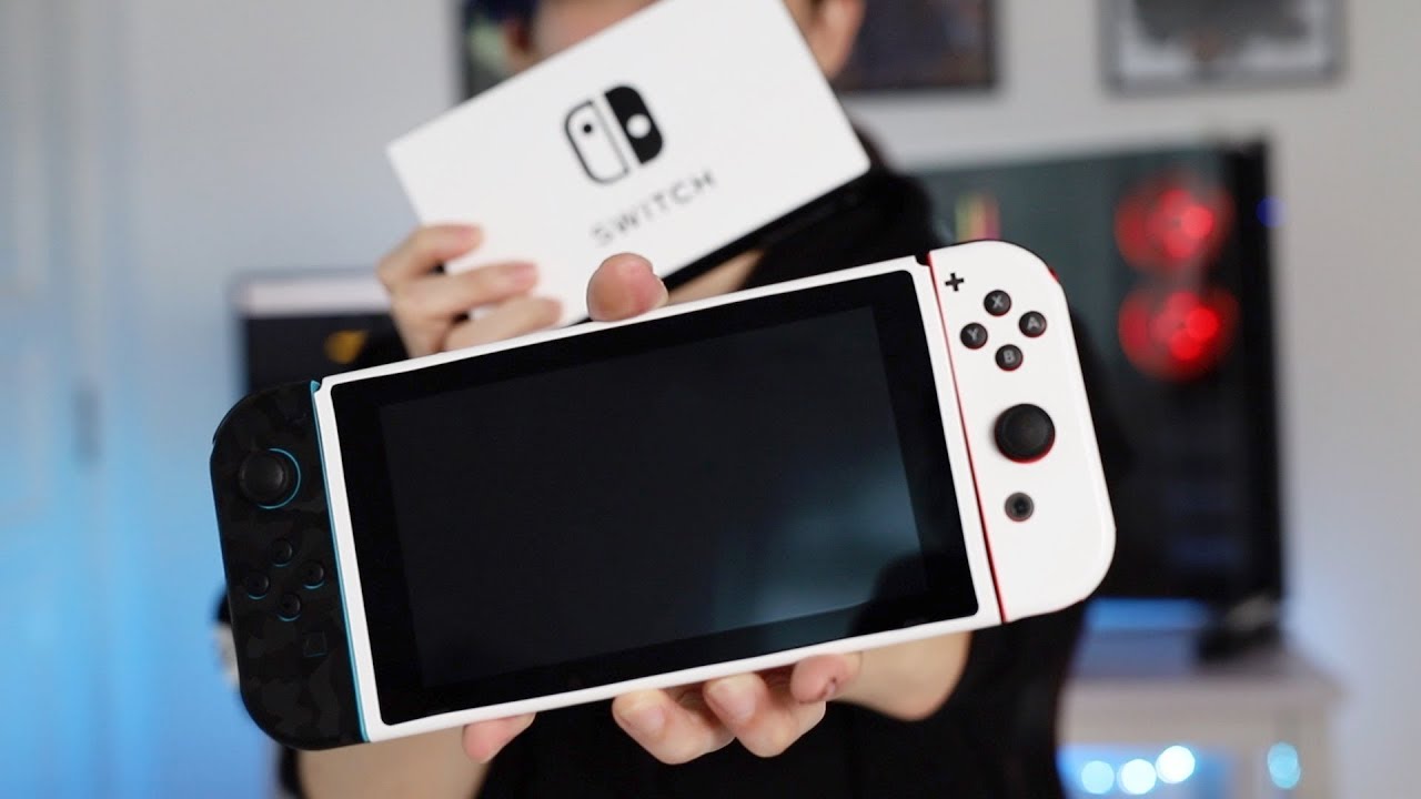 White Nintendo Switch using the Dbrand Skin
