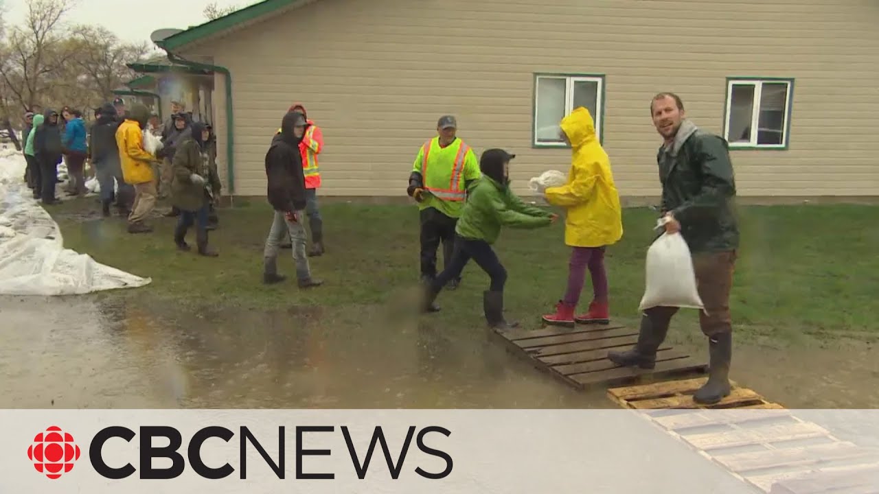 Volunteers fight flooding in western Manitoba amid heavy rainfall