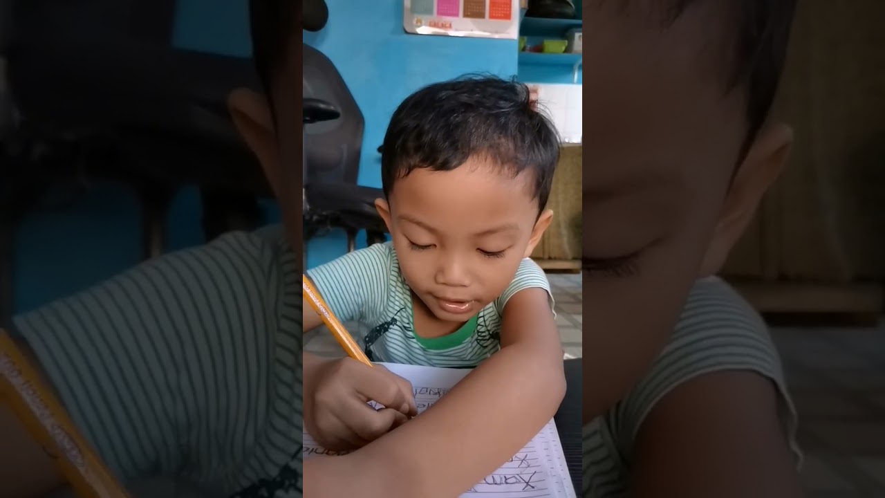 MY TODDLER TRACING HIS NAME 