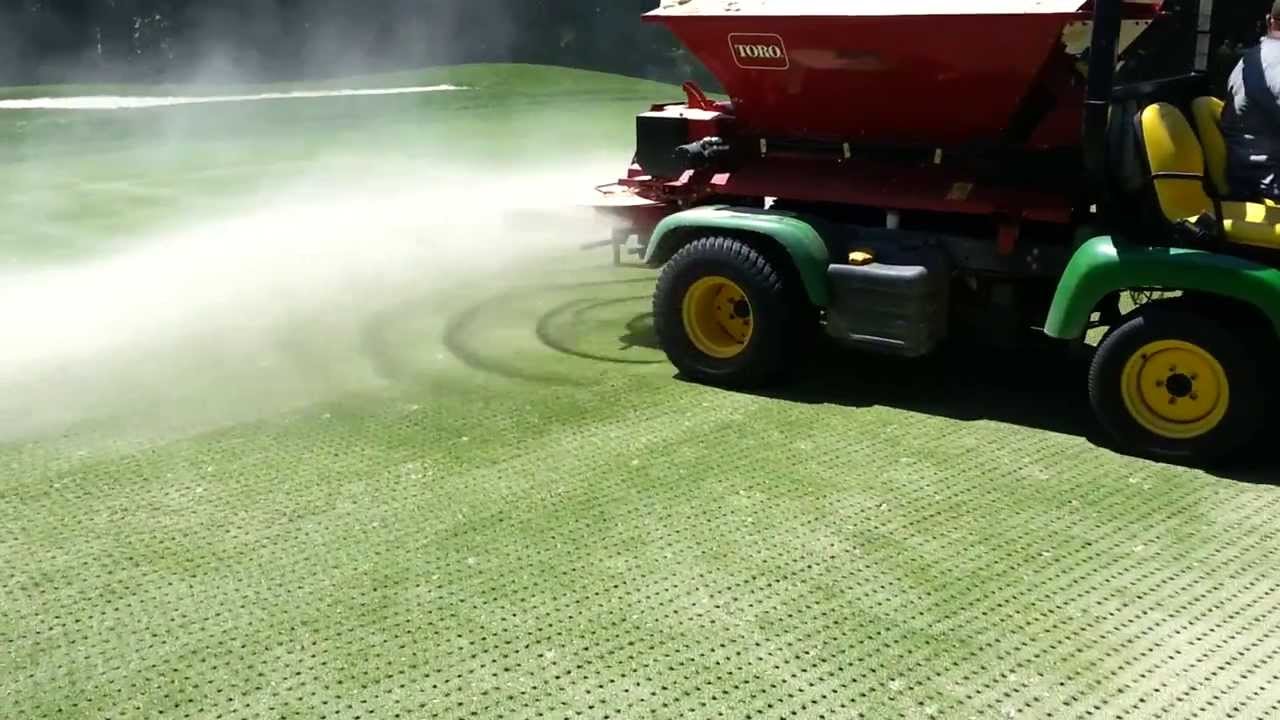 Golf Course greens aeration - topdressing sand