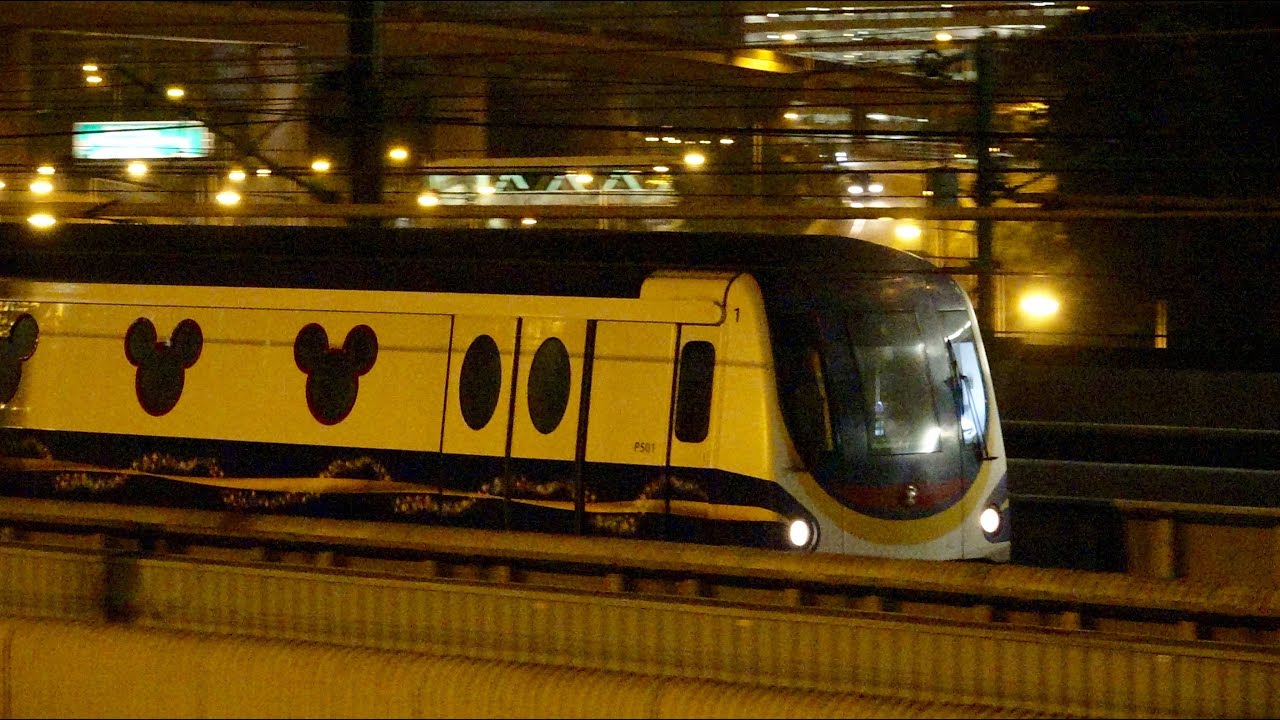 ****港鐵迪士尼綫 M-Train (TS#1) 經東涌綫茘景站路軌前往九龍灣車廠