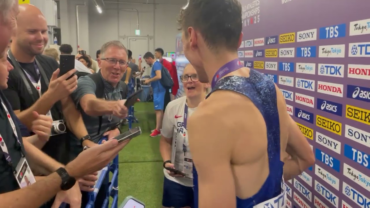Geoff Wightman embraces Jake Wightman after dramatic world 1500m final in Tokyo