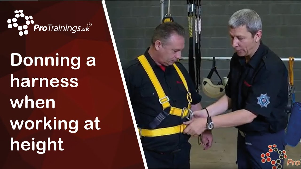 Donning a harness when working at height