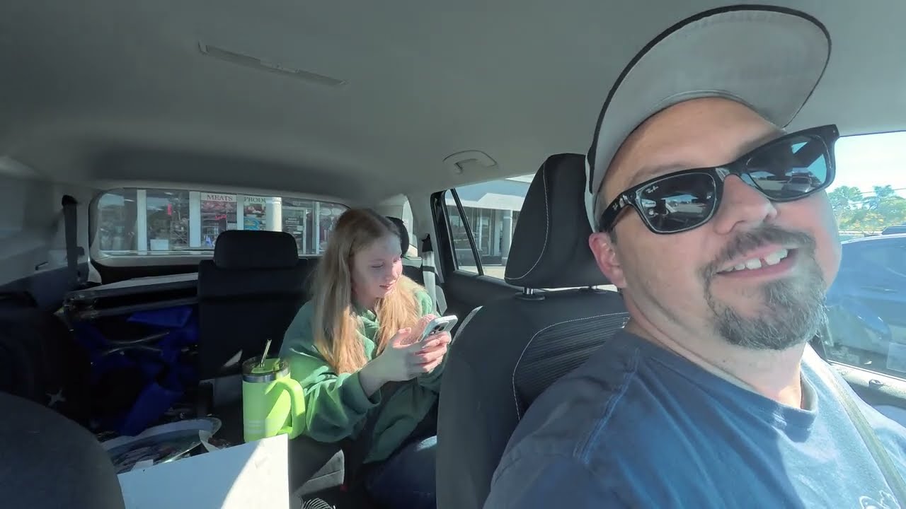 We try to sell Janell's cookbook coloring book at the market (Vlogmas 20)