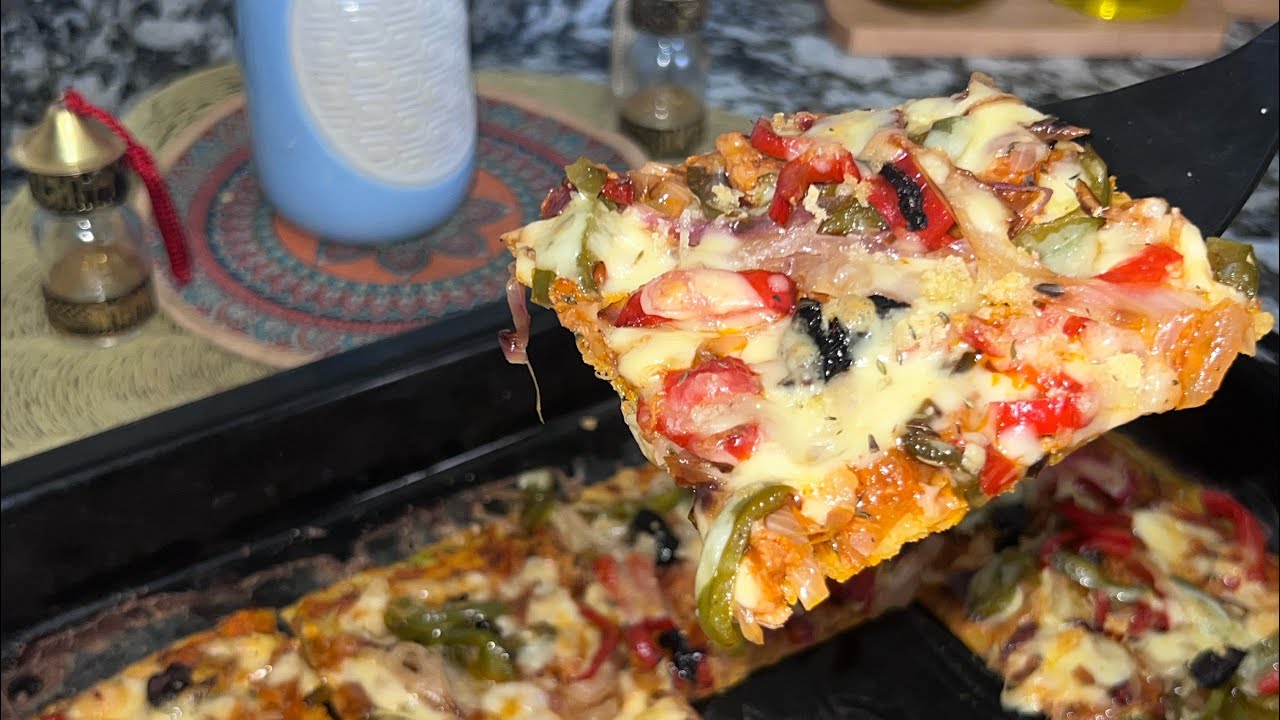 بيتزا بالخضر 🍕🍕لي كتجي بنينة صحية وسهلة التحضير#بيتزا #عشاءلذيذ #وجبة_صيفية 👌🏻👌🏻