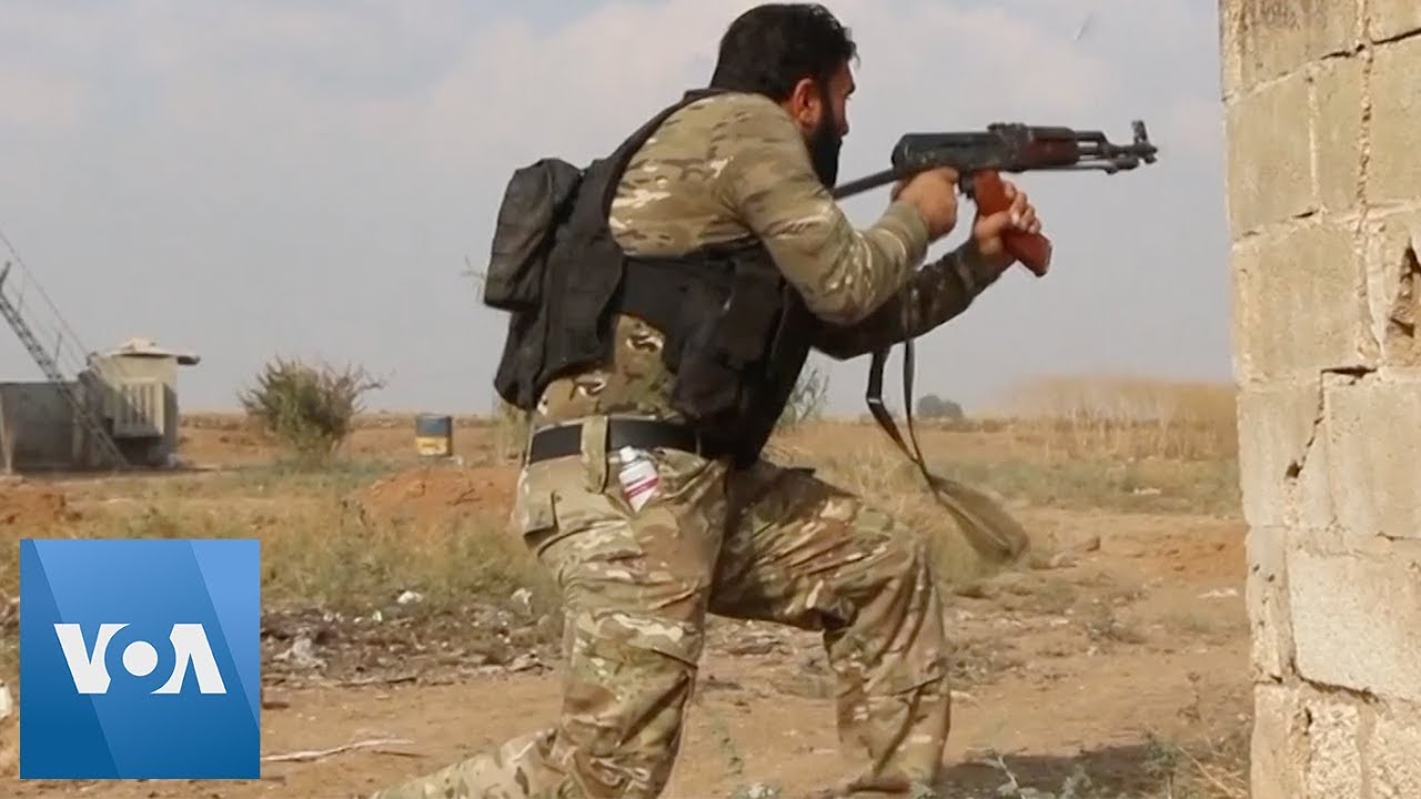 Turkey-Backed Fighters Clash with Kurds in Syria