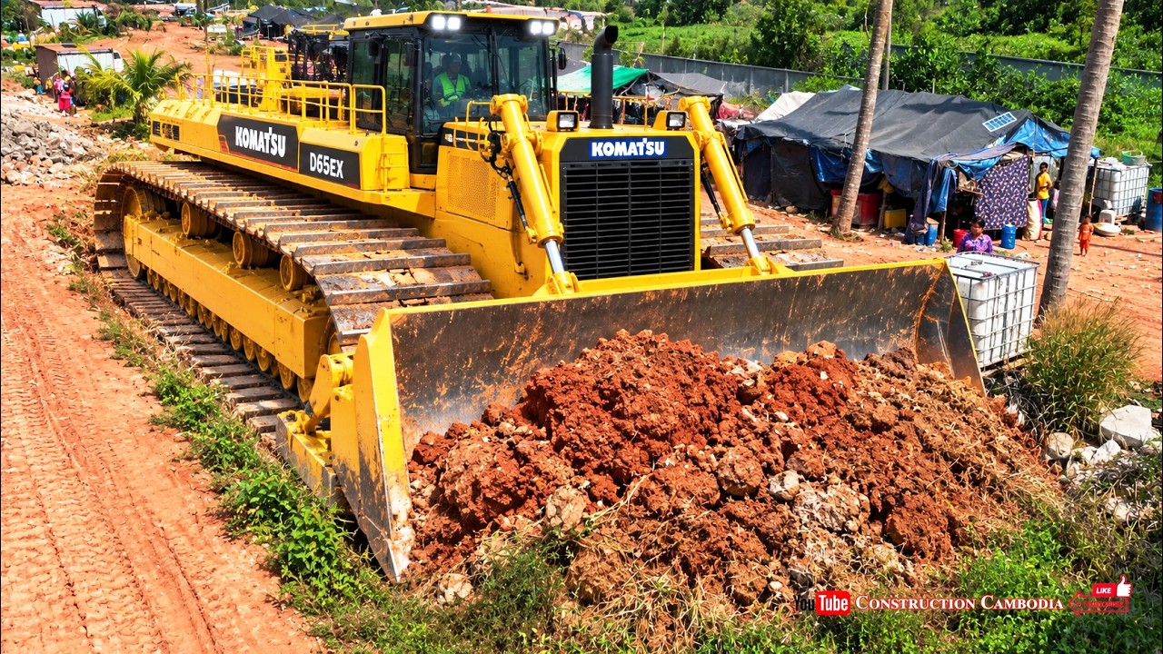 MASSIVE KOMATSU D65EX BULLDOZER at Tropical Worksite and Clearing Giant Rocks Beside a Mountain Road