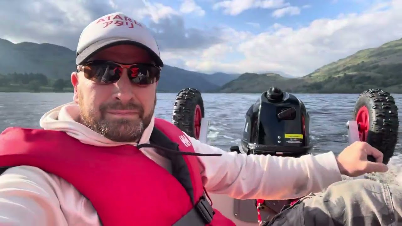 Aqua Marina aircat with orca 8hp outboard on Loch Lomond