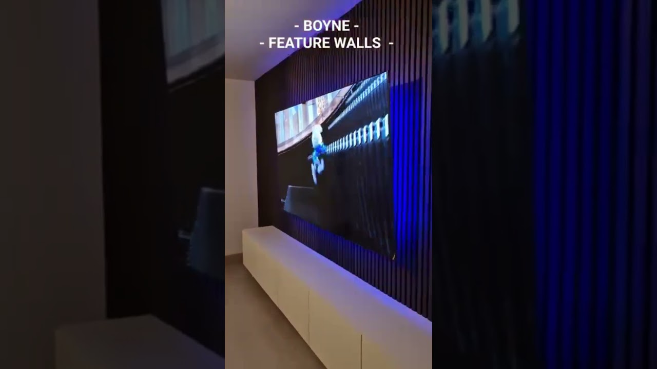 New Media Wall built by Boyne Feature Walls with White floating unit and smoked Oak panels