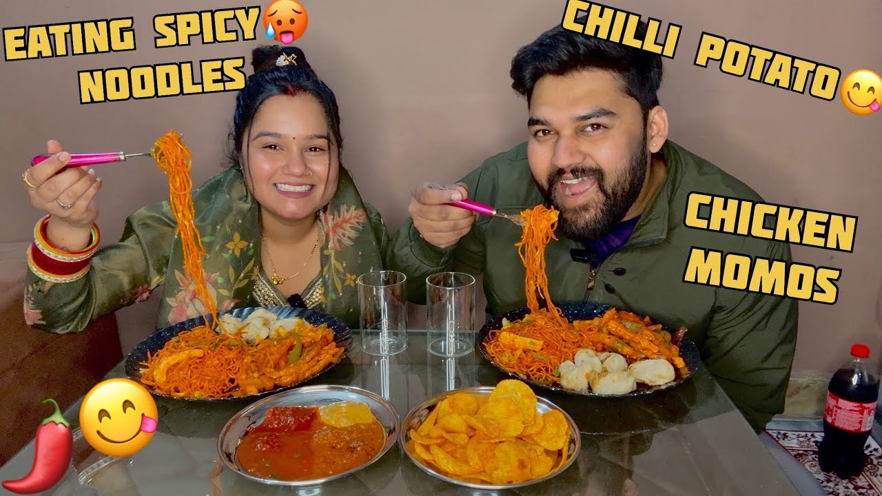 Eating spicy 🥵 singapuri noodles, chilly potato, chicken momos 