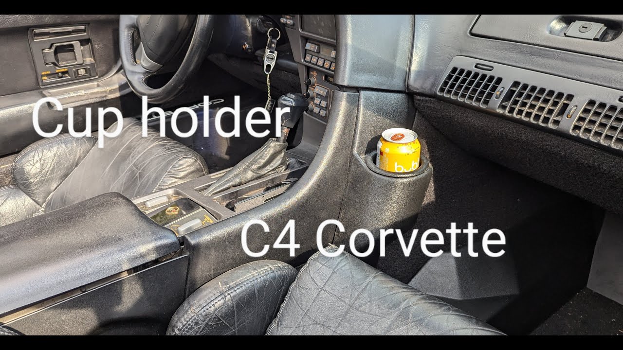 Aftermarket cup holder for the C4 Corvette. It is available at Ecklers 84-96