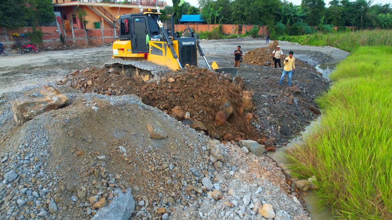 Project Bulldozer Landfill Stones work Road on Water Using Skill  and Truck Unloading Stone Filling