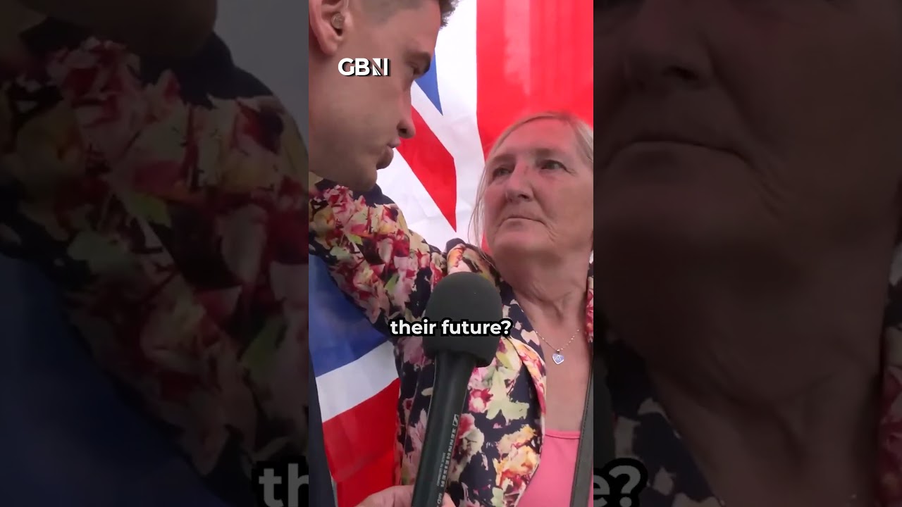 Lone British woman STANDS UP to protesters outside migrant hotel