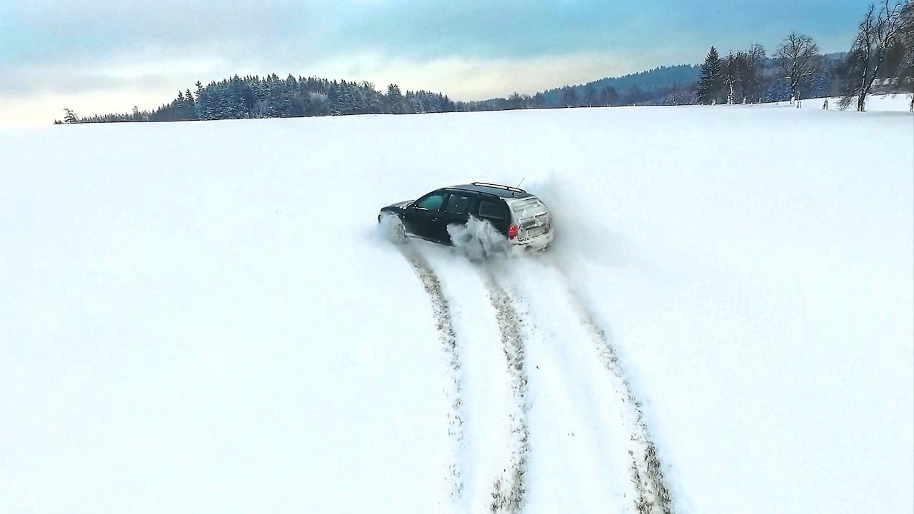 Skoda Octavia 4x4 snow drift slow motion