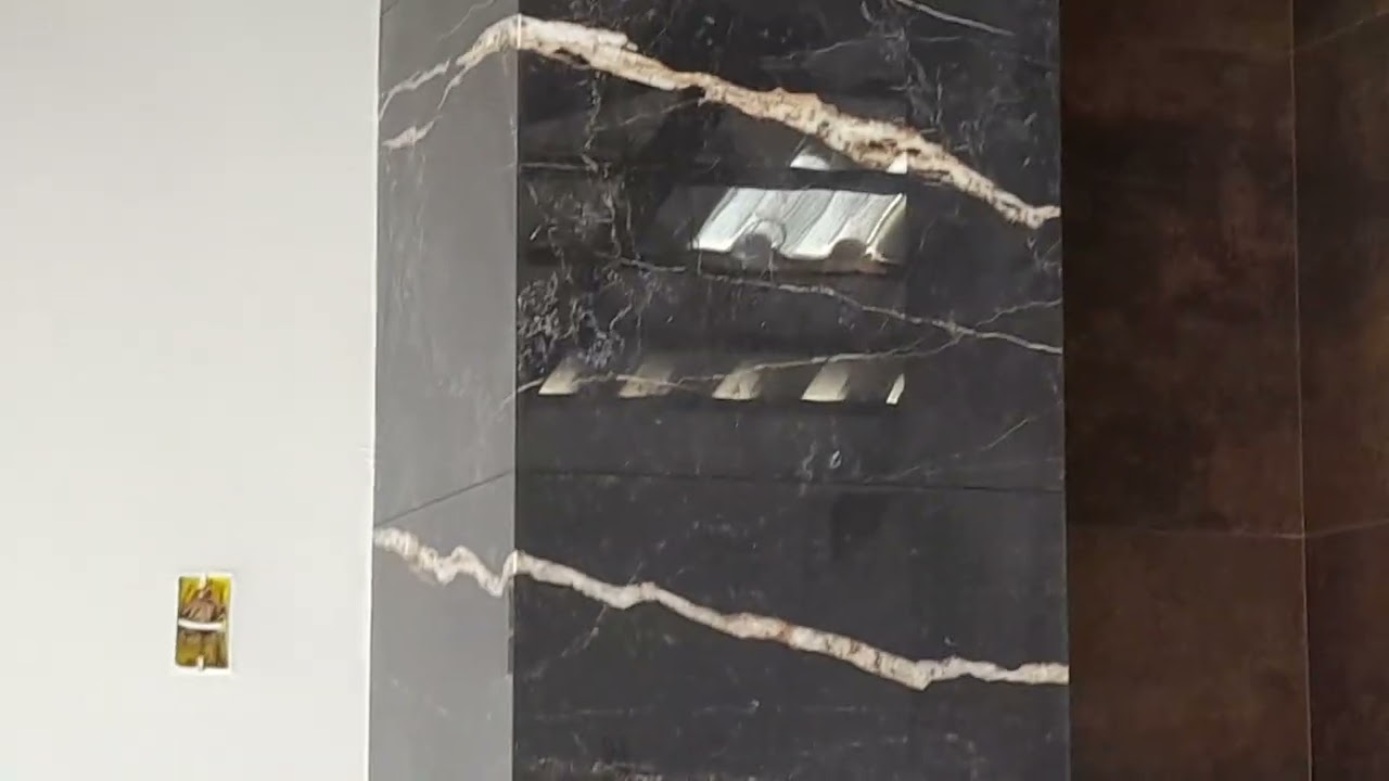 churrasqueira de porcelanato  e bancada de preto são Gabriel.