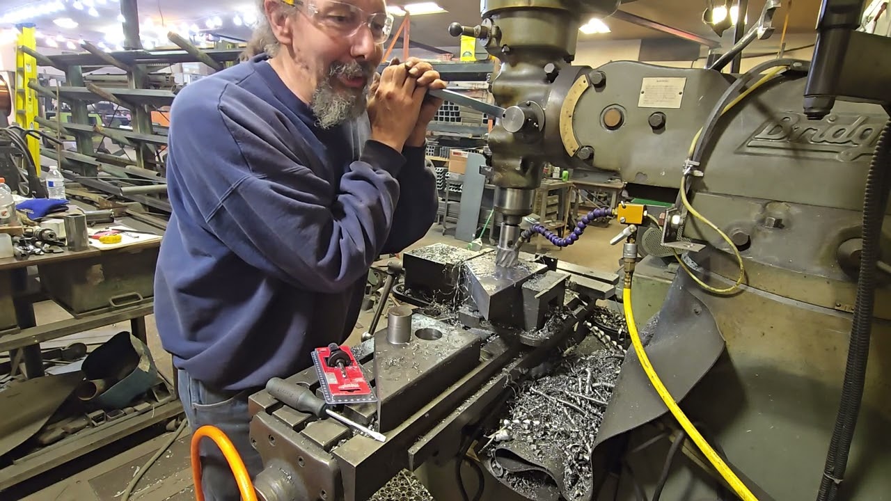 Boring a 2 inch hole with an annular cutter on a Bridgport mill. Minnesota Implement.