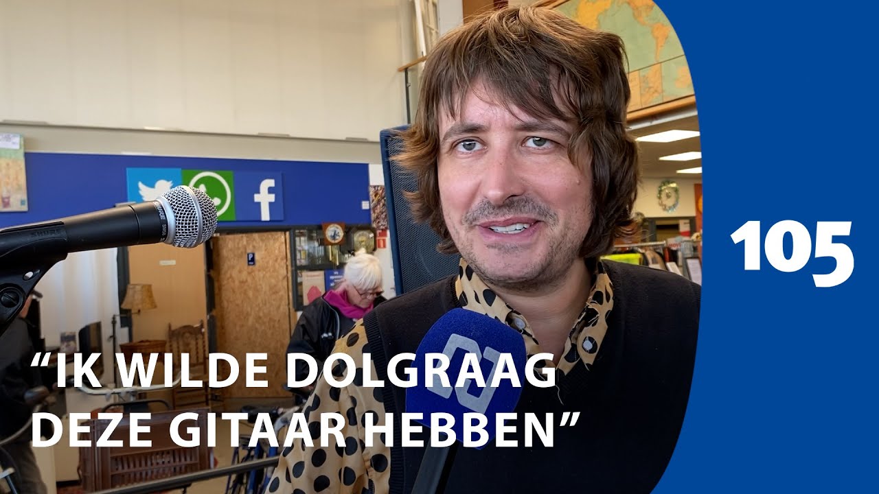 Yorick van Norden krijgt van kringloopwinkel unieke Gibson-gitaar in ruil voor optreden| Haarlem105