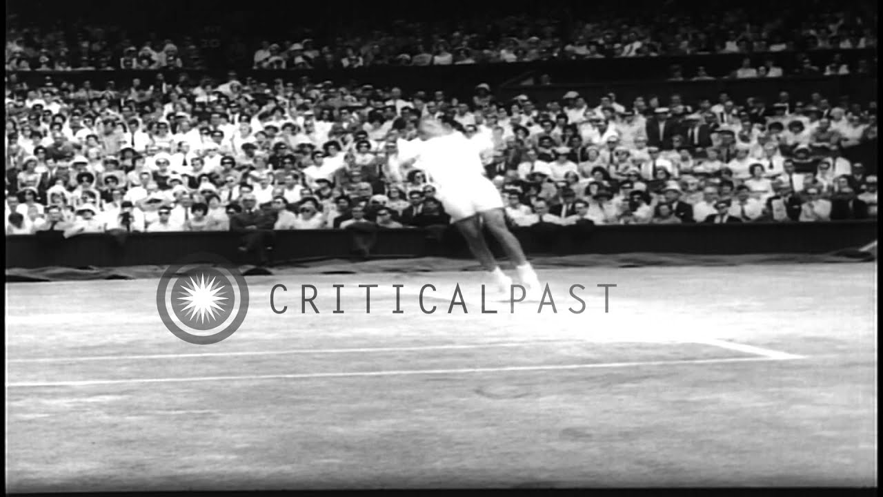 Rod Laver beats Chuck McKinley in a Men's Singles Tennis match during Wimbledon i...HD Stock Footage
