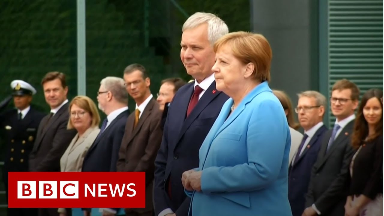 Angela Merkel seen shaking for a third time - BBC News