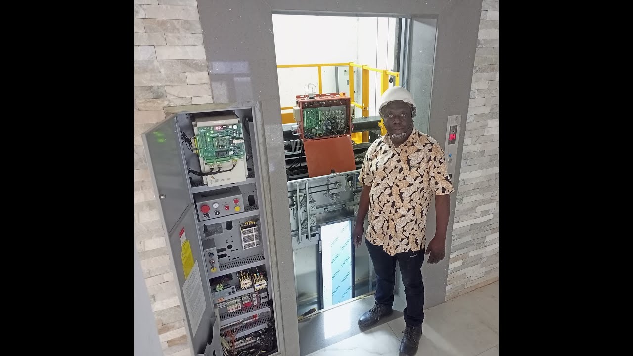 Machine roomless, gearless, steel belt traction elevator, driven by a variable frequency motor
