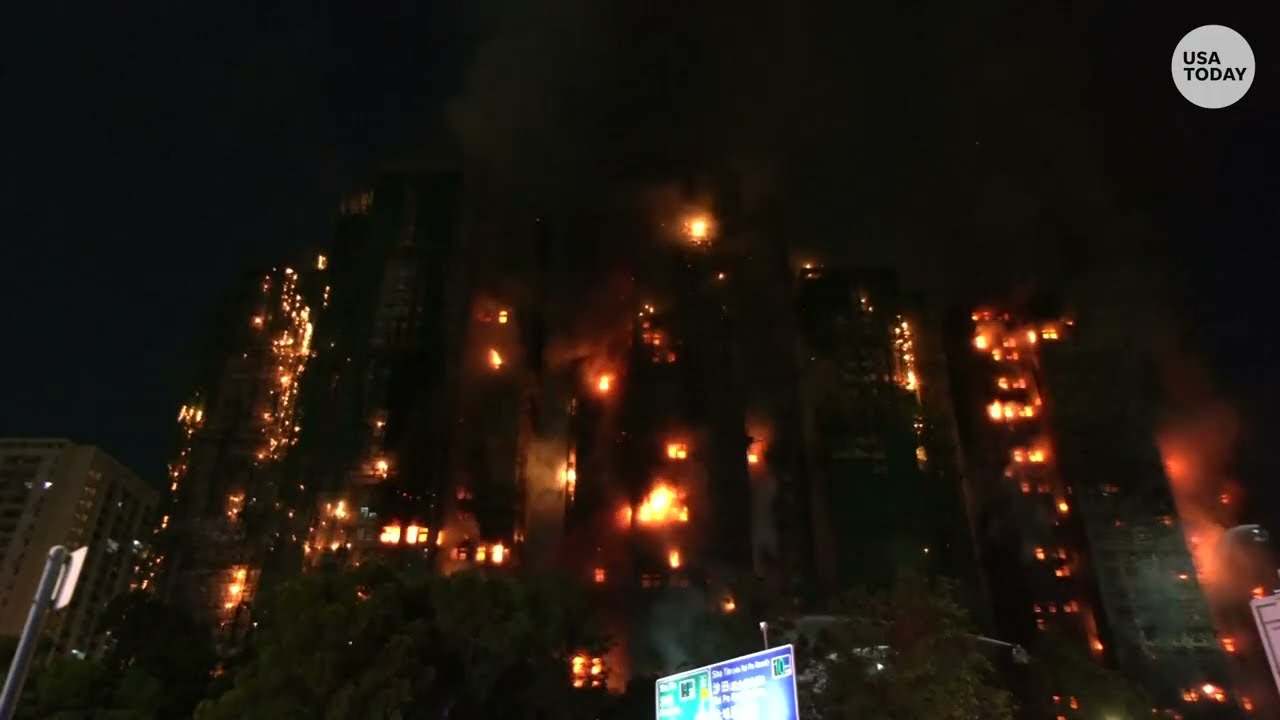 Deadly Hong Kong fire at Tai Po apartments burns from day to night