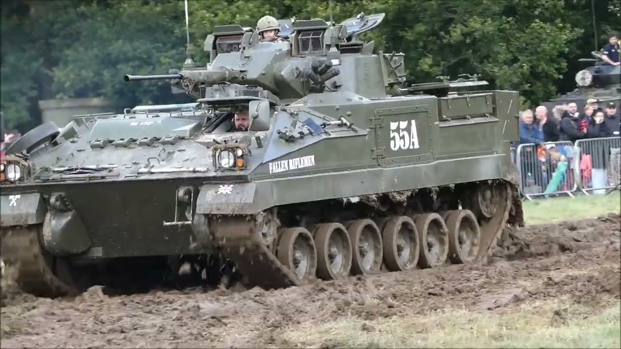 Warrior AIFV, showing its abilities in the mud at the Capel Military Show 2024