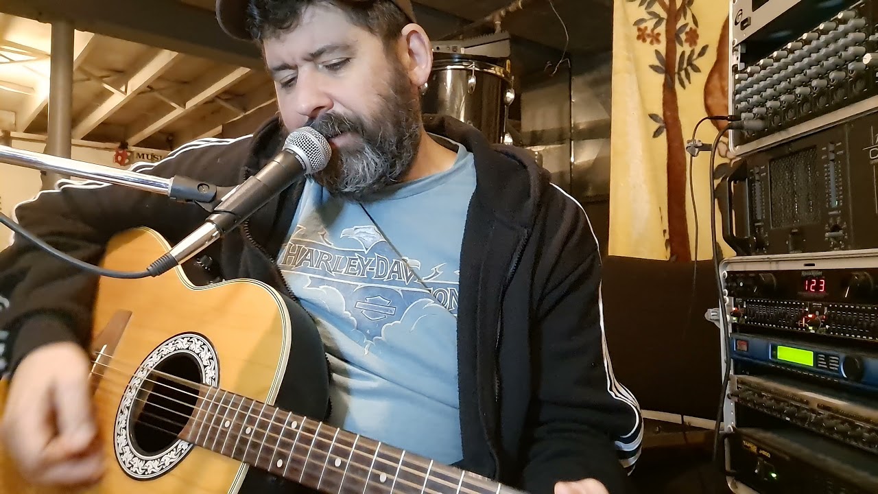 Folsom Prison Blues on Acoustic guitar.