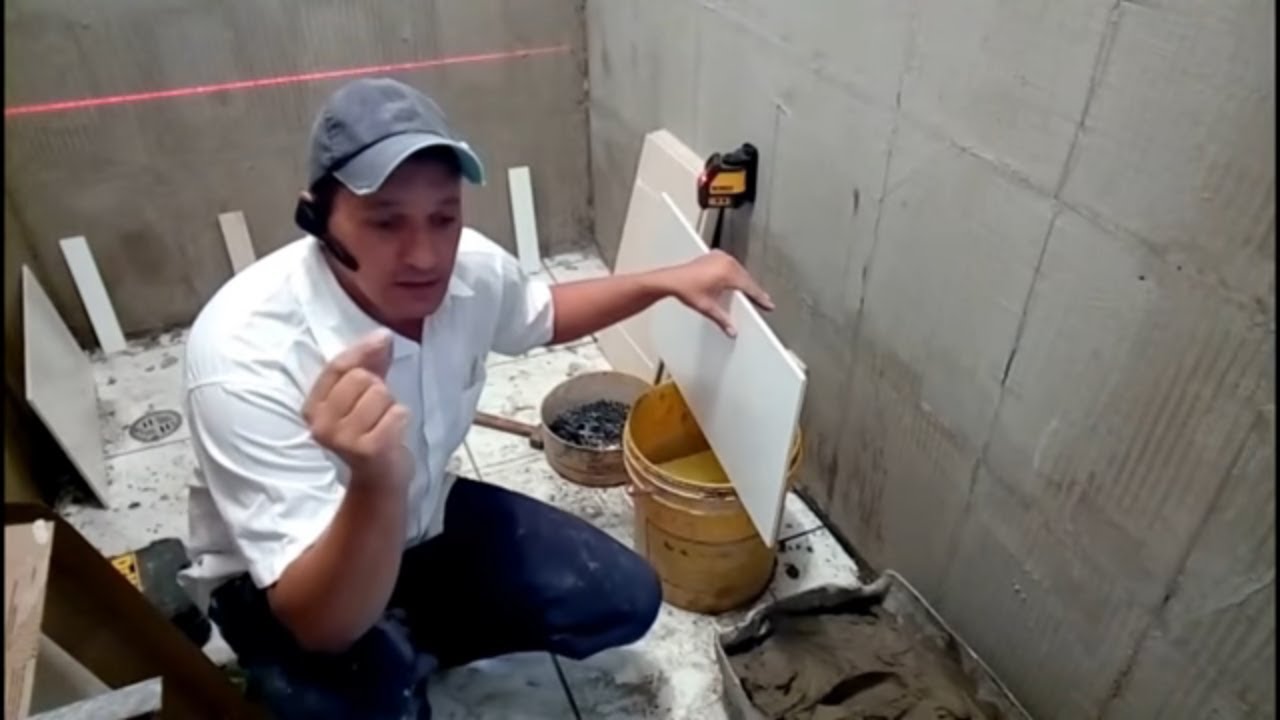 Como começar o assentamento do revestimento na parede do banheiro passo a passo-Parte 1