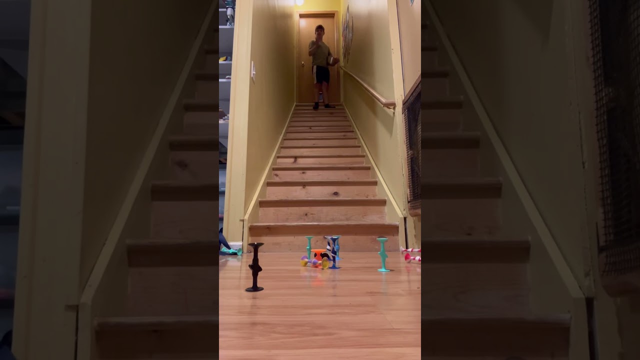 Popdart trickshot down the stairs 