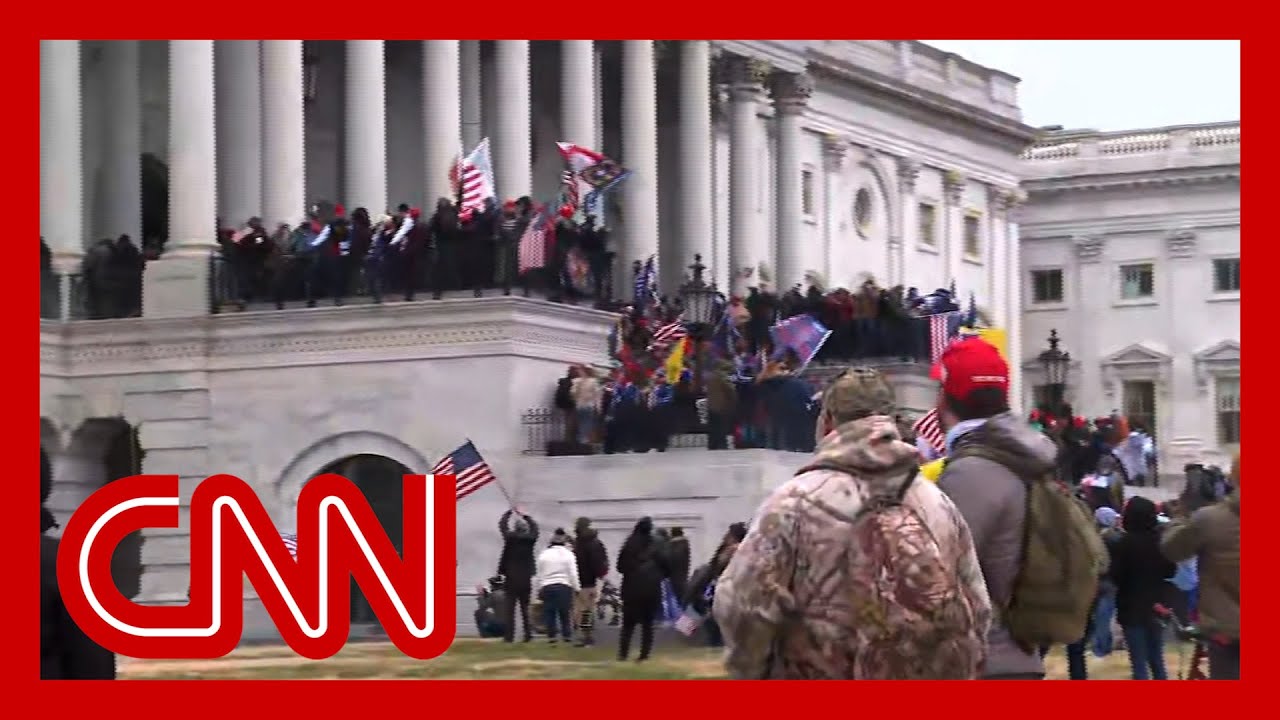 Pro-Trump rioters storm US Capitol steps