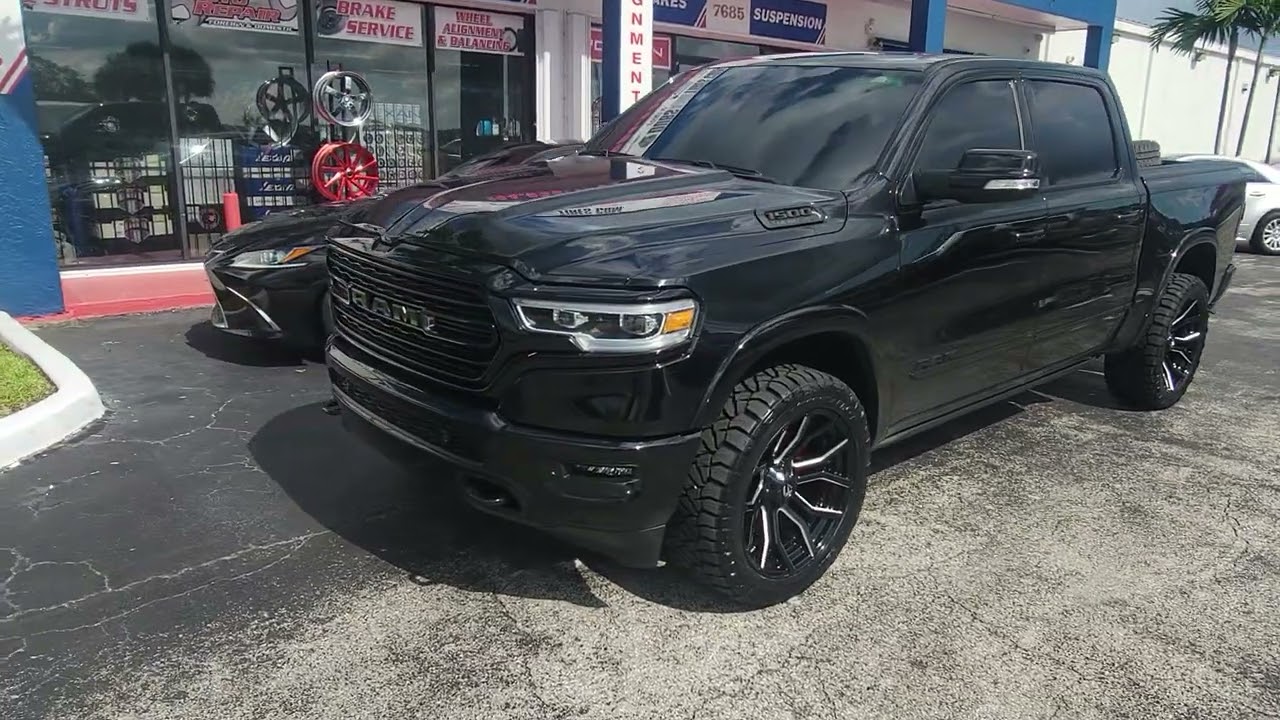 877-544-8473 22 Inch Rims Dodge Ram DUBSandTIRES.com 33x12.50r22 Nitto Ridge Grapplers
