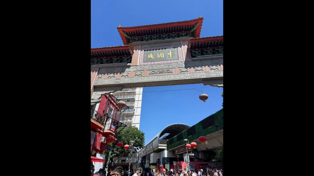 Talking Travel Plans In Chinatown