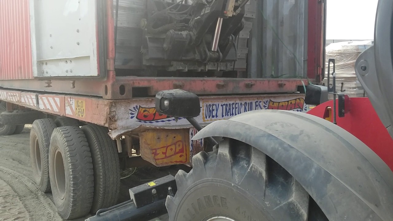 UNLOADING FROM CONTAINER