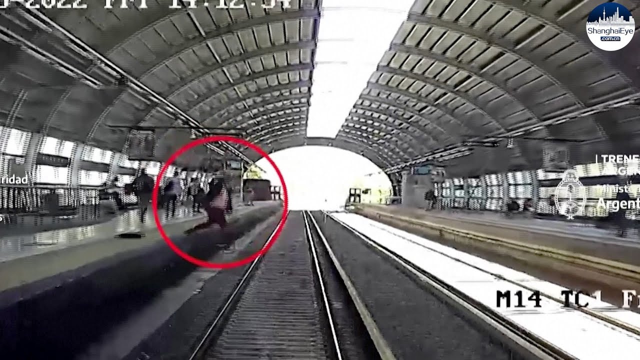 Dramatic CCTV video captures MOMENT commuter fell onto tracks in front of an arriving train