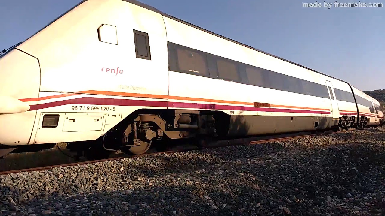 Trenes Regionales serie 599 en Iznalloz y Deifontes (Granada)