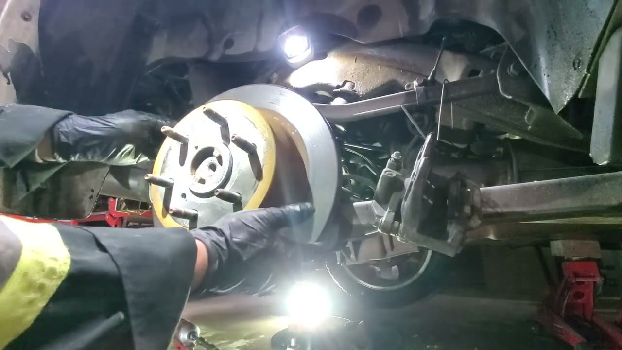 Cadillac Escalade Axle,  Seal, Bearing and C-clip Replacement. Change Differential Fluid.