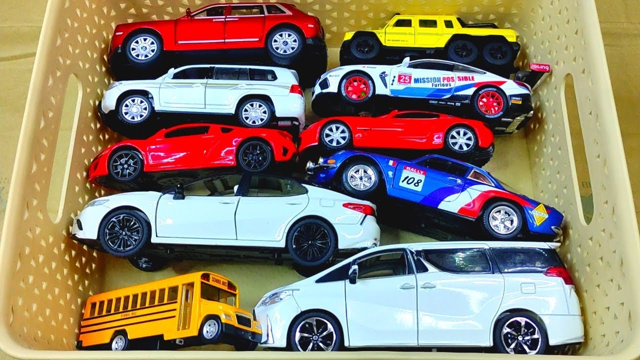 Box full of Mini EV, Lexus LM300h, Land Cruiser, Lamborghini, DHL, Rolls Royce, Police car ...