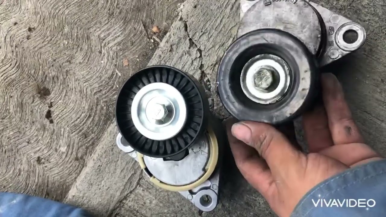 Como cambiar el tensor de la banda de accesorios. (Chevrolet aveo).