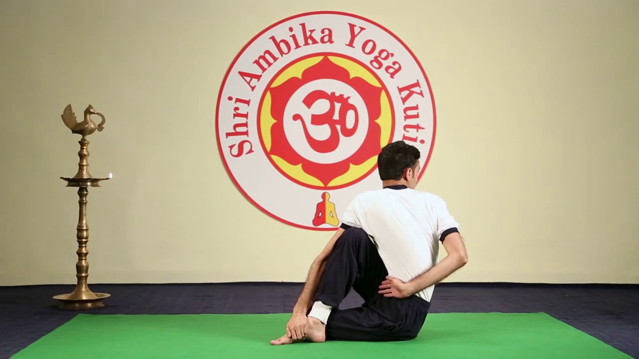 Ardha Matsyendrasana - अर्धमच्छेद्रासन - Shri Ambika Yoga Kutir