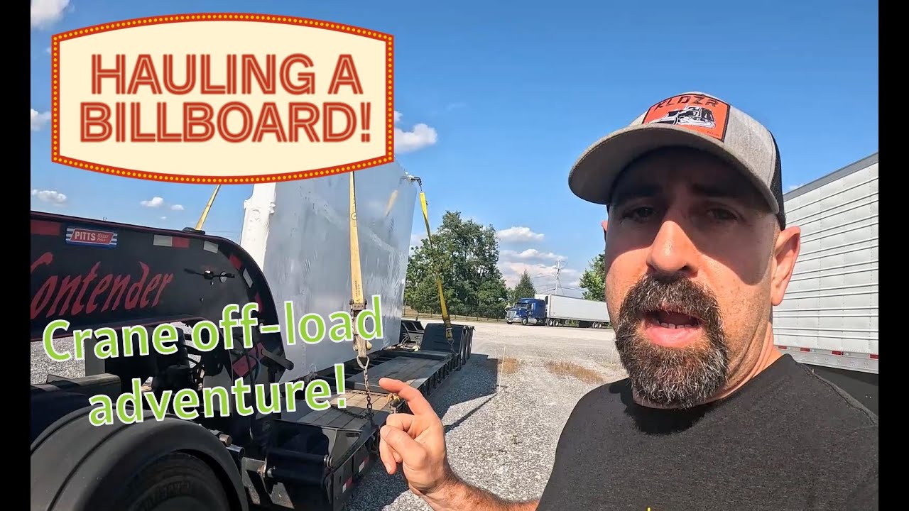 Hauling a digital billboard! Crane off-load makes this one very interesting!