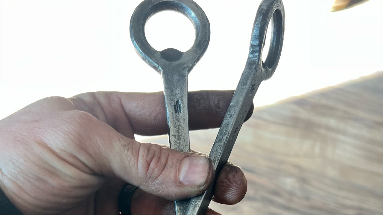Forging a throwing spike bottle opener. ( easy )