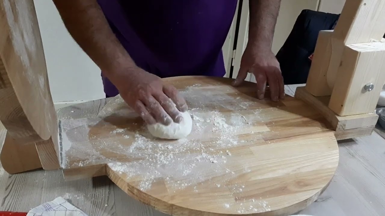 Homemade pizza dough press