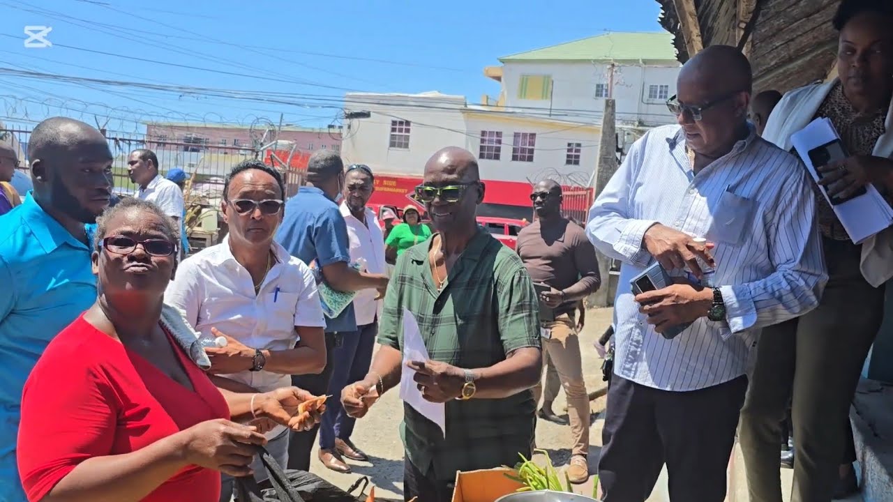 MINISTER DESMOND MACKENZIE TOURS THE REOPENED YALLAHS MARKET IN ST.THOMAS