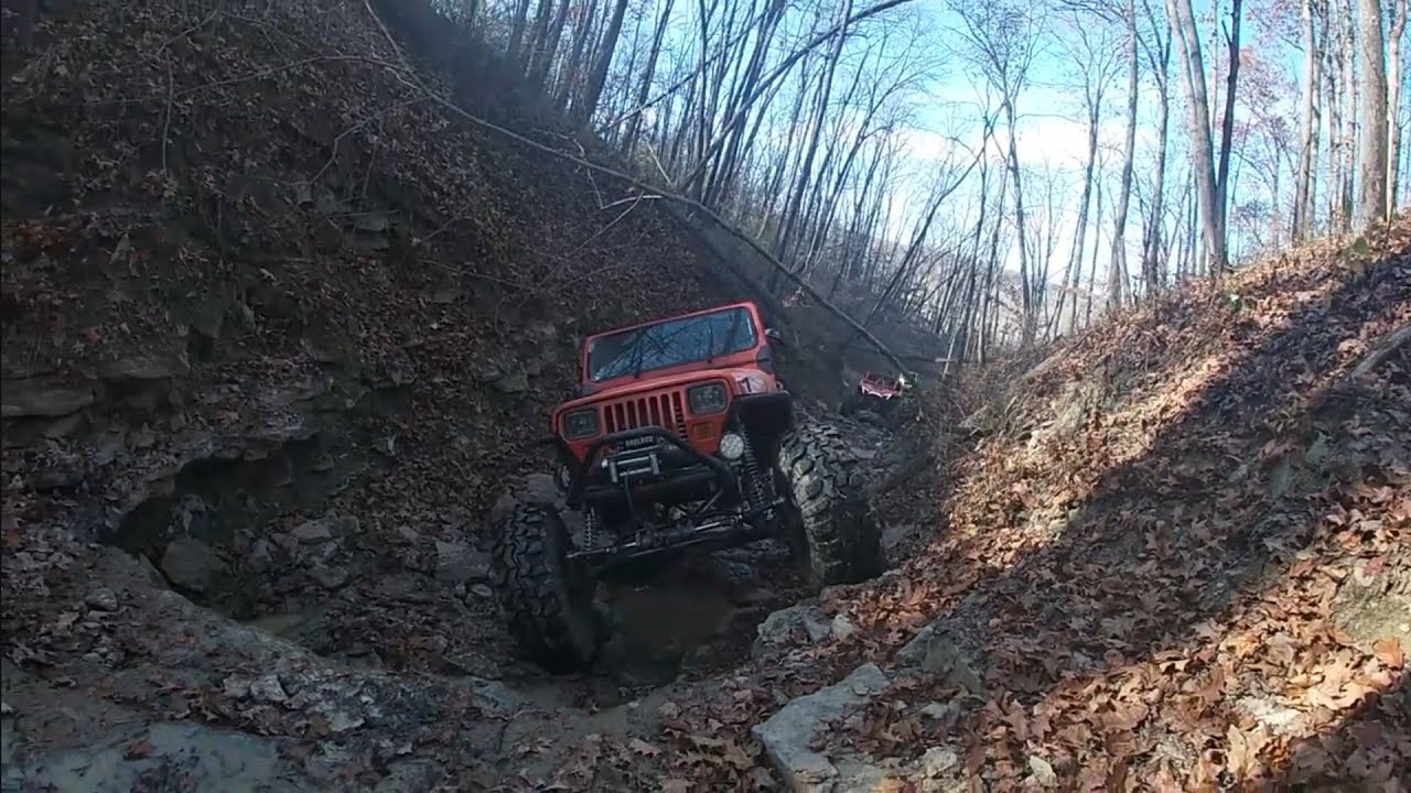 CREEK CRAWLIN @ HASPIN ACRES  JEEPS TAKE ON ROCK LEDGES